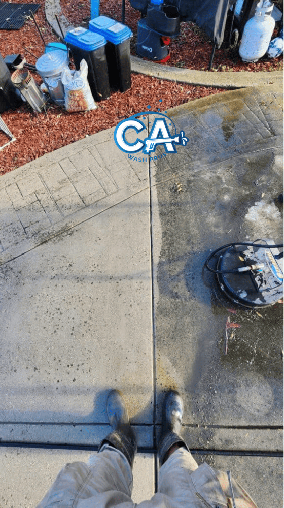 Pressure washed driveway surface with a like-new look in Pleasanton, CA.