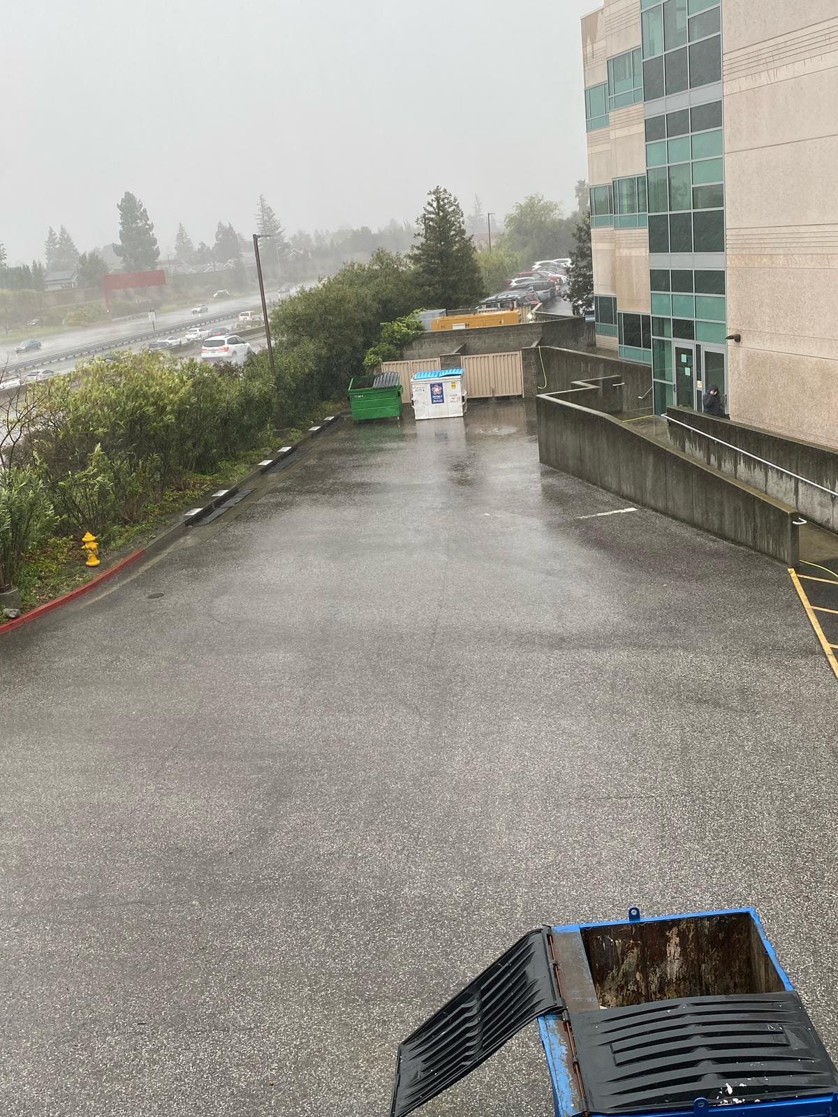Power washing service restoring a commercial driveway’s clean look in San Mateo.