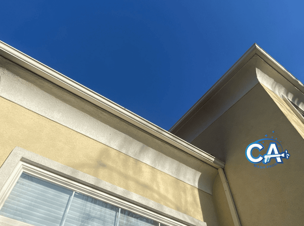 Gutter cleaned and cleared for proper drainage in San Leandro, CA.