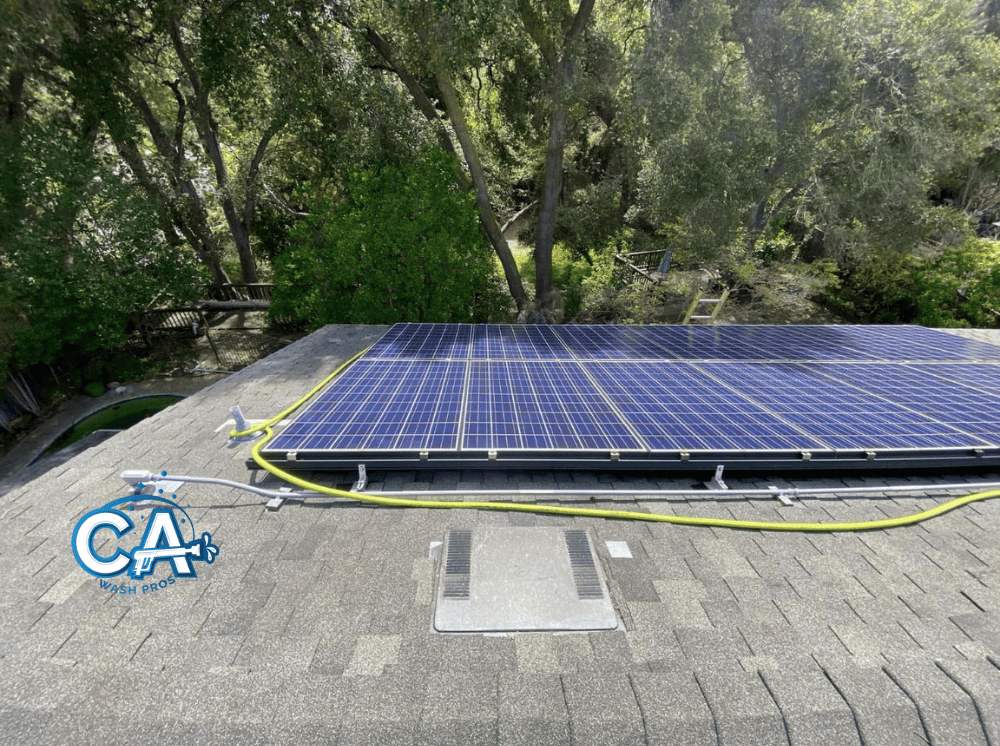 Solar panels in Alameda being cleaned to improve energy efficiency.