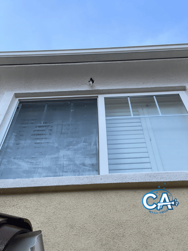 Windows before a professional cleaning service in San Leandro, CA.