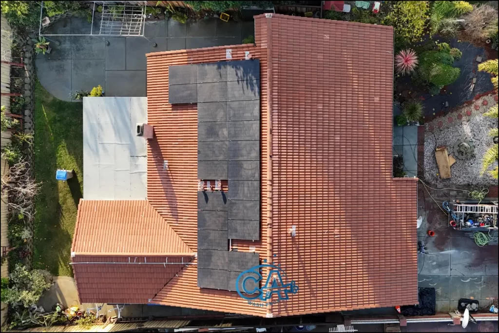 Freshly cleaned roof captured by our drone.